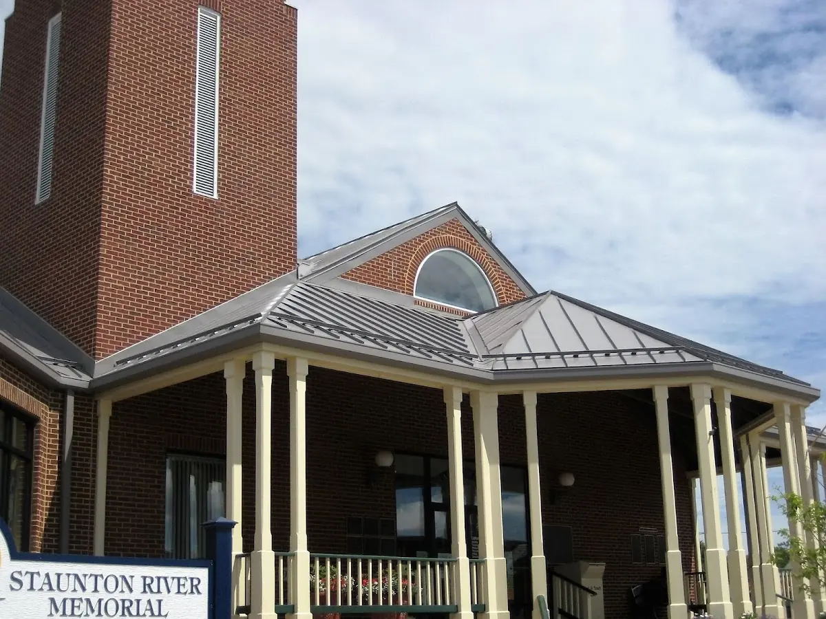 Skilled roofing craftsmen working on a residential roof in Knightdale